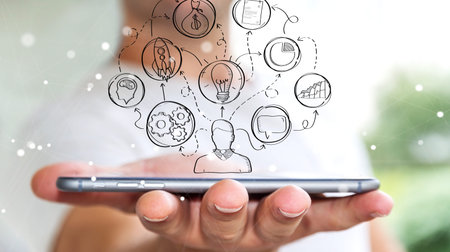 Businessman on blurred background using manuscript project presentation with his phone