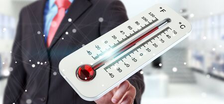 Businessman checking the temperature rise with a thermometer 3D renderingの写真素材