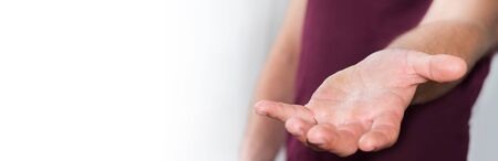 Panorama view of empty businessman hand on blurred backgroundの写真素材