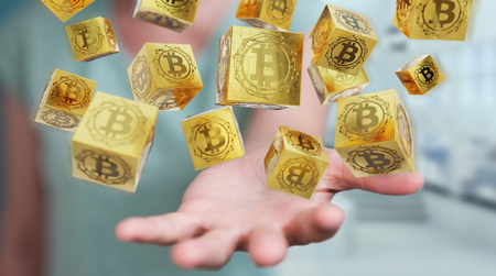 Businesswoman on blurred background using bitcoins cryptocurrency 3D renderingの写真素材