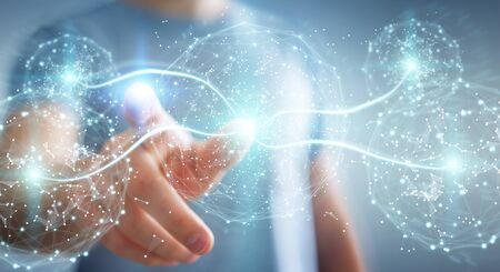 Businessman on blurred background using digital network connection sphere 3D renderingの写真素材