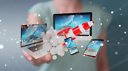 Businesswoman on blurred background connecting tech devices and startup rocket 3D rendering