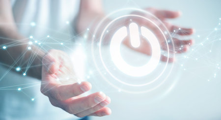 Businessman on blurred background using 3D render power button with connectionsの写真素材