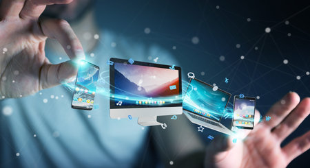 Businessman connecting tech devices and icons applications with each other 3D rendering