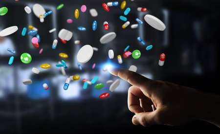 Businessman on blurred background holding and touching floating medicine pills 3D rendering