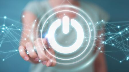 Businesswoman on blurred background using 3D render power button with connectionsの写真素材