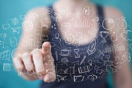 Businesswoman on blurred background holding and touching manuscript project presentationの写真素材