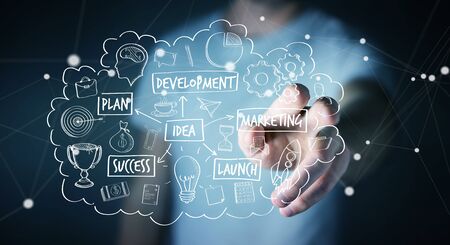 Businessman on blurred background using manuscript project presentation with his handの写真素材