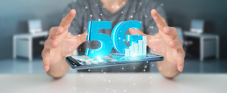 Businessman on blurred background using 5G network with mobile phone 3D renderingの写真素材