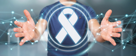 Businessman on blurred background using digital ribbon cancer interface 3D renderingの写真素材