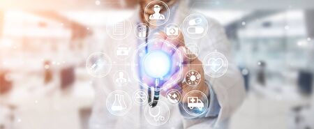 Doctor on blurred background using digital medical futuristic interface 3D renderingの写真素材