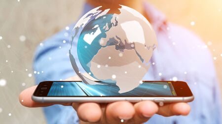 Businessman on blurred background using flying white and blue 3D rendering earthの写真素材