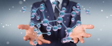 Businessman on blurred background using modern molecule structure 3D renderingの写真素材