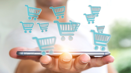 Businessman on blurred background using digital shopping icons 3D renderingの写真素材