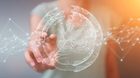 Businesswoman on blurred background using planet earth network sphere interface 3D renderingの写真素材