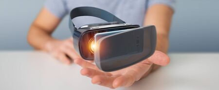 Businessman on blurred background using virtual reality glasses technology 3D rendering