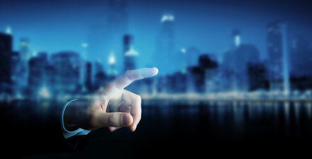 Businessman pointing finger on blurred background 