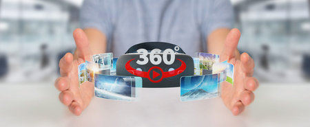 Businessman on blurred background using virtual reality glasses technology 3D renderingの写真素材