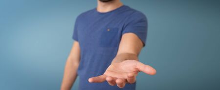 Businessman showing empty hands on blurred backgroundの写真素材