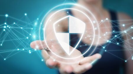 Busineswoman on blurred background using shield safe protection with connections 3D renderingの写真素材
