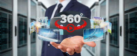Businessman on blurred background using virtual reality glasses technology 3D renderingの写真素材