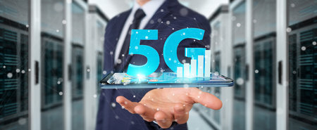 Businessman on blurred background using 5G network with mobile phone 3D rendering