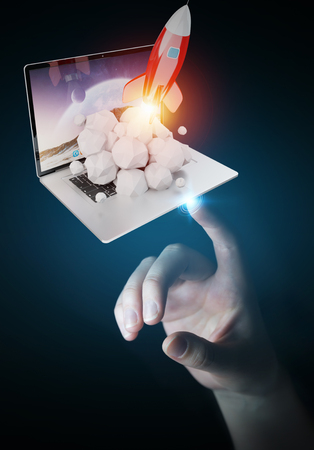 Businesswoman on blurred background with rocket launching from a laptop 3D renderingの写真素材