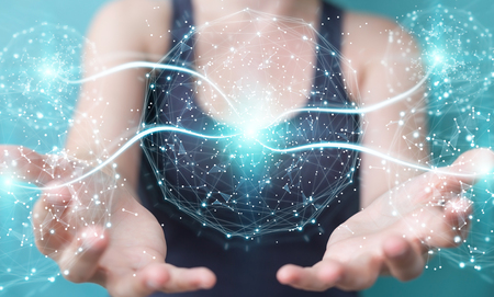 Businesswoman on blurred background using digital network connection sphere 3D renderingの写真素材