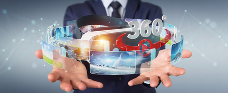 Businessman on blurred background using virtual reality glasses technology 3D renderingの写真素材