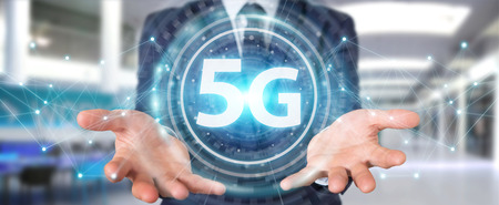 Businessman on blurred background using 5G network interface 3D renderingの写真素材
