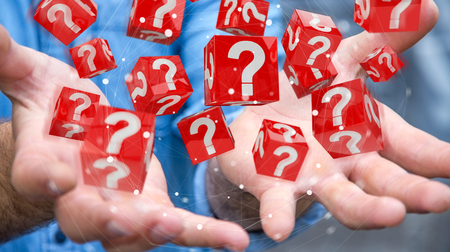 Businessman on blurred background using cubes with 3D rendering question marksの写真素材