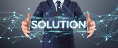 Businessman on blurred background using solution digital text 3D rendering