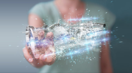 Businesswoman on blurred background using wireframe holographic 3D digital projection of an engine
