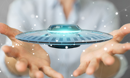 Businesswoman on blurred background with retro UFO spaceship 3D renderingの写真素材