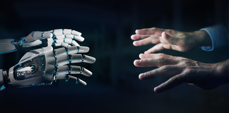 Robot hand making contact with human hand on dark background 3D renderingの写真素材