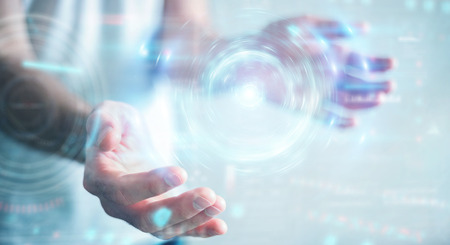 Businessman on blurred background creating new futuristic energy power source 3D renderingの写真素材