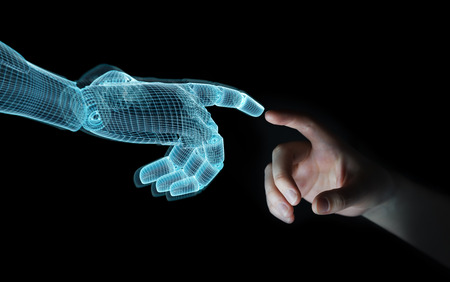 Wireframed Robot hand making contact with human hand on dark background 3D renderingの写真素材