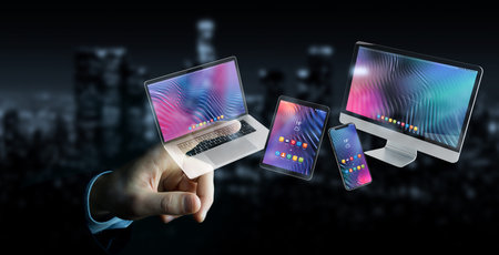 Businessman on dark background connecting modern smartphone tablet laptop and computer 3D rendering