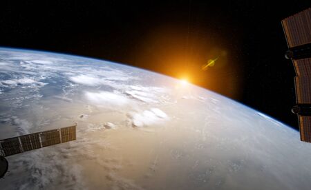 View of blue planet Earth from a space station window during a sunrise 3D rendering elementsの写真素材