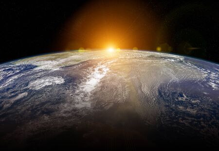 View of blue planet Earth close up with atmosphere during a sunrise 3D renderingの写真素材