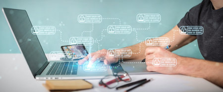 Graphic designer on blurred background protecting his datas with thin line security interface