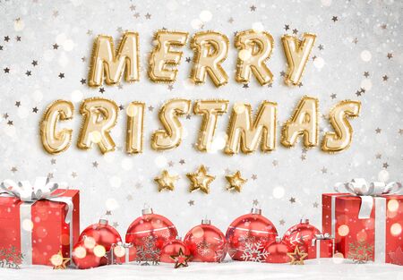 Christmas card greetings with foil balloons and red decorations 3D renderingの写真素材