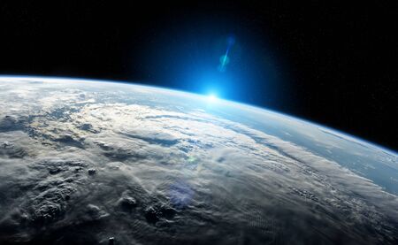 View of blue planet Earth close up with atmosphere during a sunrise 3D renderingの写真素材