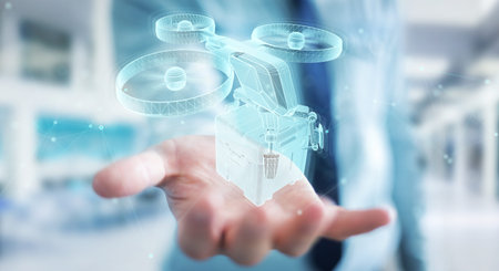 Businessman on blurred background holding and touching holographic delivery drone projection in his...