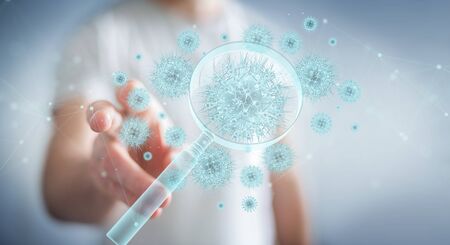 Man on blurred background analyzing holographic coronavirus projection through magnifying glass 3D renderingの写真素材