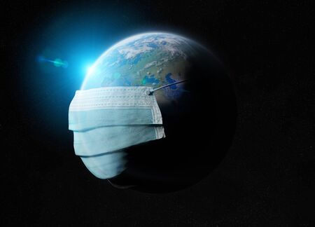 The world covered by a surgical mask from the Coronavirus pandemic. Covid-19 spreading in Europe between countries.の写真素材