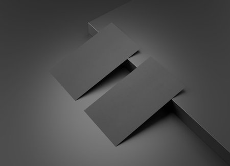Two black US business card Mockup on black background. American size calling card front and back laying on empty surface 3D renderingの写真素材