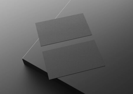Two black US business card Mockup on black background. American size calling card front and back laying on empty surface 3D renderingの写真素材