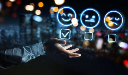 Man hand on dark background using customer satisfaction rating interface 3D renderingの写真素材
