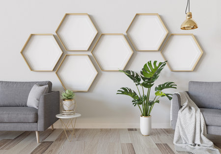 Gold hexagon blank photo frames mockup hanging on white interior wall. Empty hexagonal pictures in...